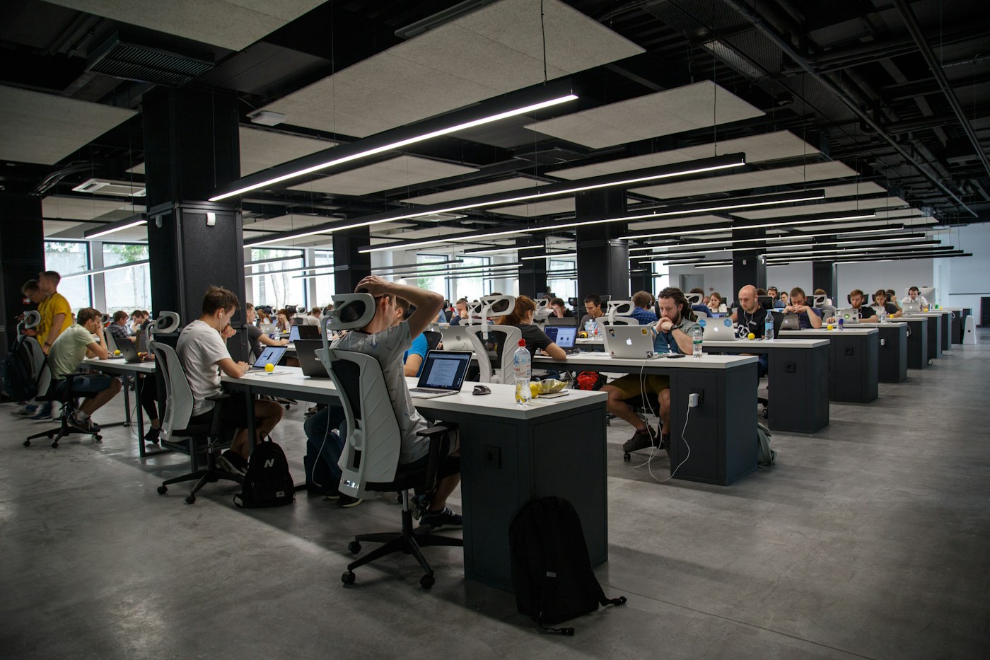 People collaborating in a technology workspace